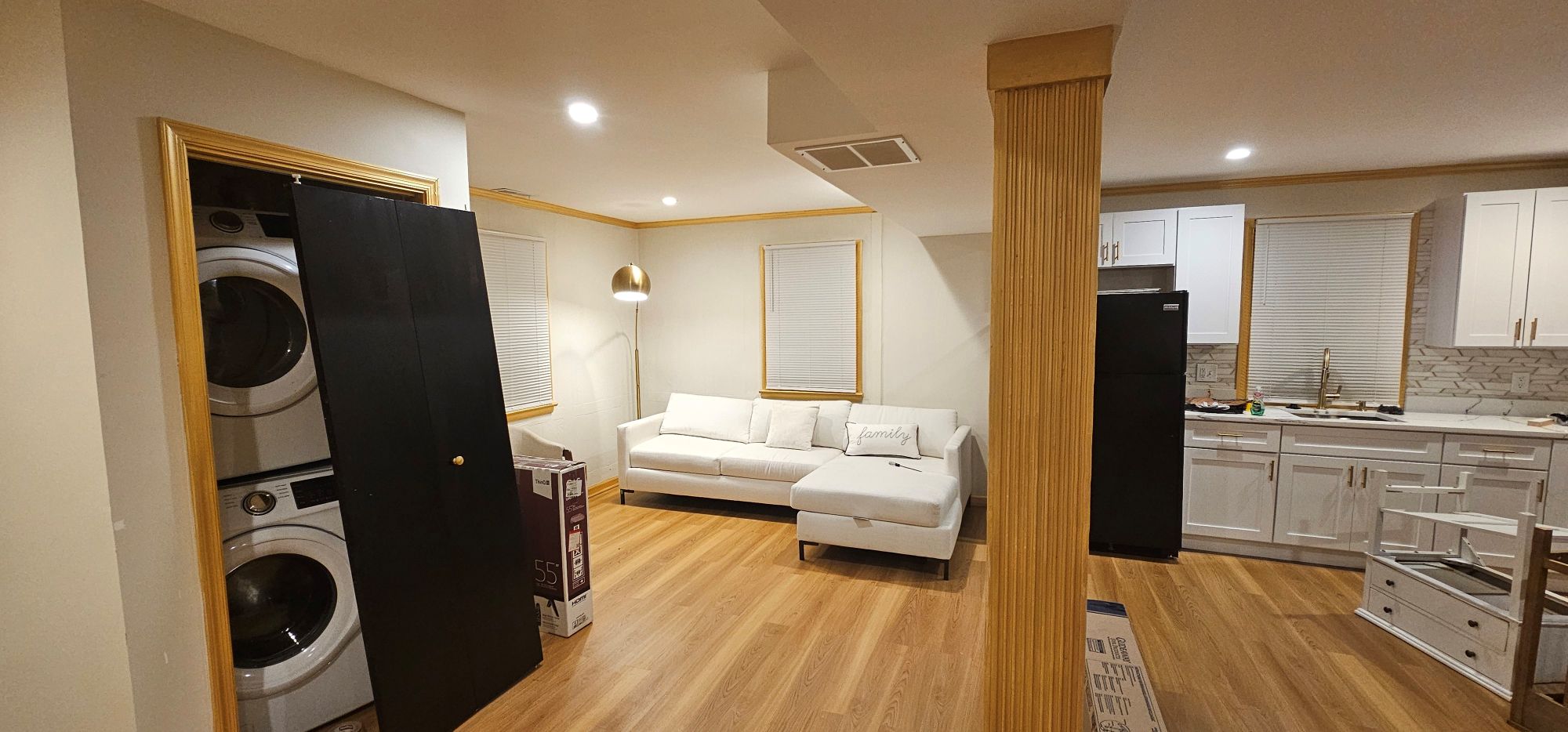 The Legacy Villa Modern living space with laundry area